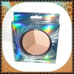 SOLD.   Nicole Miller New York Bronzing Trio Compact